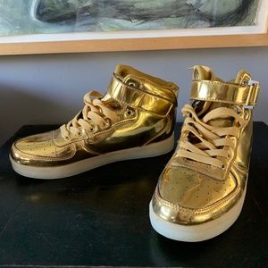 Gold high top sneakers